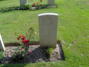 Headstone of Oney O'Keefe, buried at La Laiterie Military Cemetery, Belgium. 