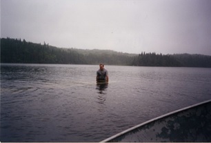 Photograph of Marcus McLaren holding up wing 17 August 2000